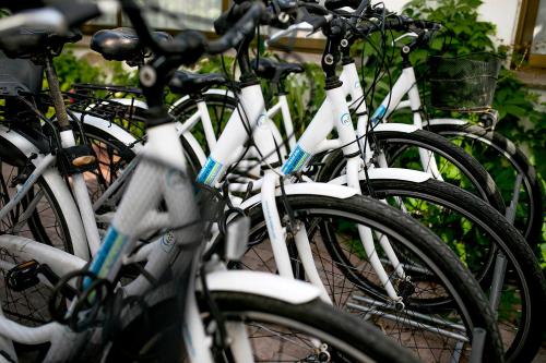 a row of white bikes parked next to each other at Hotel Bersoca in Benicàssim