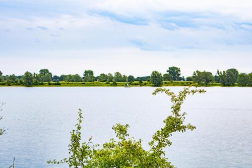 a view of a large body of water at Van Doremaele Luxury Guesthouse in Velddriel
