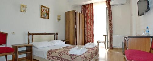 Postel nebo postele na pokoji v ubytování Boutique Hotel Eco-House Tbilisi