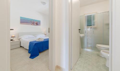 Koupelna v ubytování Spiaggia Bianca Apartments