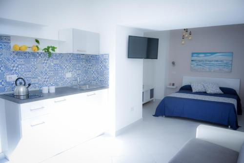 Postel nebo postele na pokoji v ubytování Luna Chiara Home