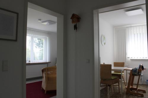 a room with a table and a dining room at Ferienwohnung im Haus Böll in Feldberg