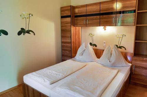 Posteľ alebo postele v izbe v ubytovaní Balaton Apartman