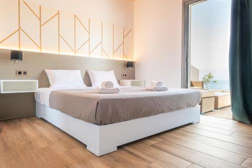 Ein Bett oder Betten in einem Zimmer der Unterkunft First House