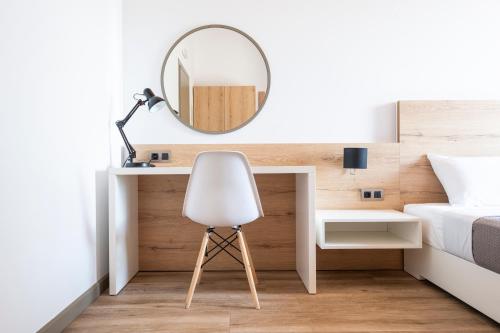 Ein Bett oder Betten in einem Zimmer der Unterkunft First House