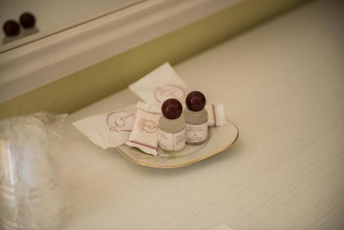 a plate with two products on a table at B&B Murichessa(Il Gelso) in Orosei