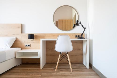 Ein Bett oder Betten in einem Zimmer der Unterkunft First House