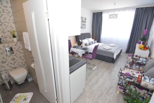Η κουζίνα ή μικρή κουζίνα στο Small Oasis Apartment