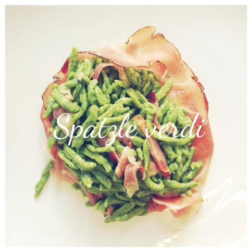 a piece of food with green beans and bacon at Hotel Juventus in Auronzo di Cadore