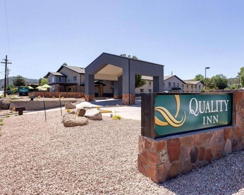 a sign for aquality inn in front of a building at Quality Inn Prescott in Prescott