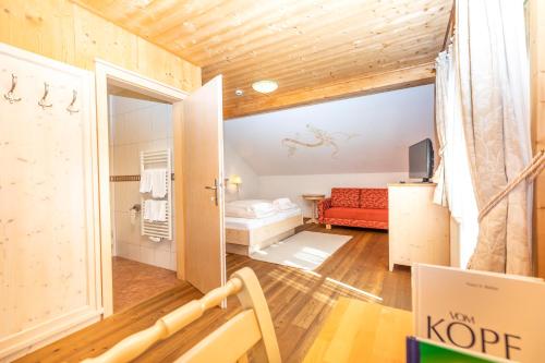 Кровать или кровати в номере Hotel Garni Sonnhof