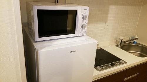 Dapur atau dapur kecil di Lieta Nakayama