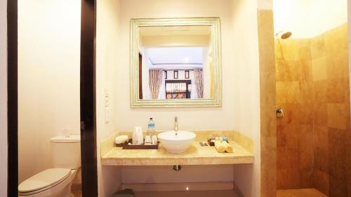 A bathroom at Vamana Resort - CHSE Certified