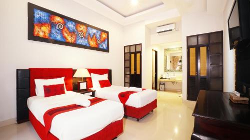 Posteľ alebo postele v izbe v ubytovaní Vamana Resort - CHSE Certified