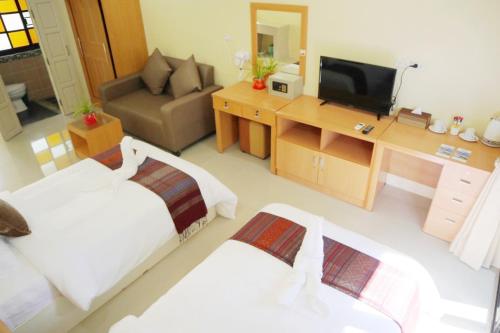 ChiangRai Lake Hillにあるテレビまたはエンターテインメントセンター