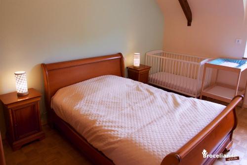 Postel nebo postele na pokoji v ubytování Gite Lancelot du Val