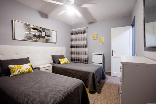 Кровать или кровати в номере Apartment Flor Azul, Las Americas