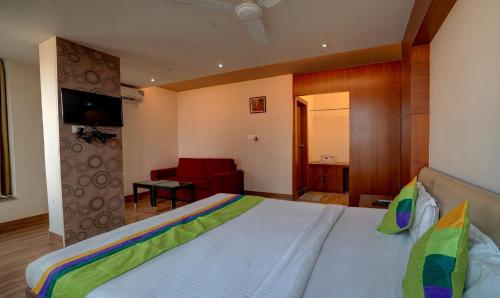 Cama o camas de una habitación en Treebo B&B