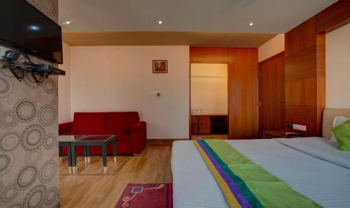 Cama o camas de una habitación en Treebo B&B