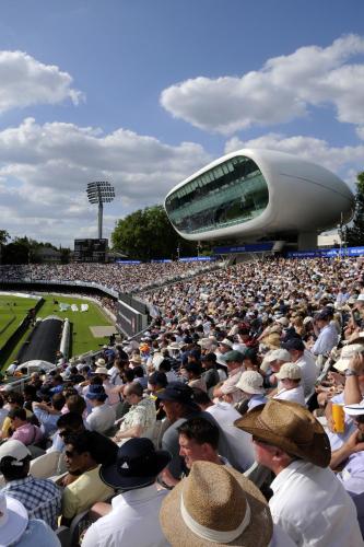 a large crowd of people watching a tennis match at Danubius Hotel Regents Park in London