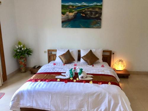 Ένα ή περισσότερα κρεβάτια σε δωμάτιο στο PITAMATA VILLAS