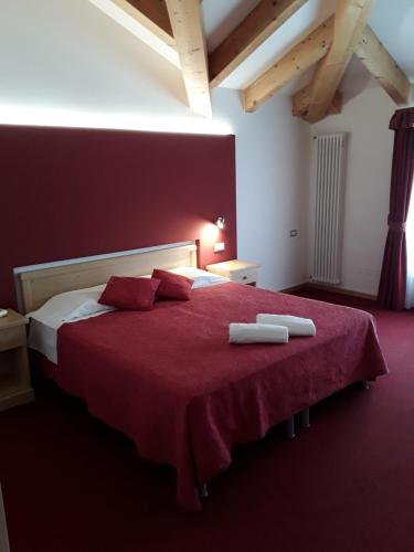 En eller flere senger på et rom på Hotel Bellaria