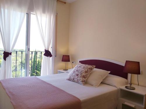 Katil atau katil-katil dalam bilik di Apartamento exterior en La Ametlla de Mar