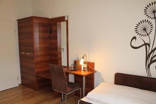 Katil atau katil-katil dalam bilik di Hotel am Viktualienmarkt