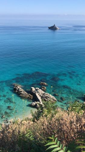 an island in the middle of a body of water at Michelino House in Parghelia