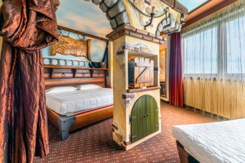 En eller flere senger på et rom på Grand Hotel Mattei