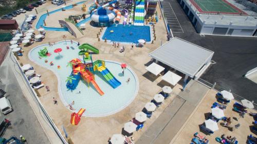 an aerial view of a water park with a playground at Tofinis Hotel in Ayia Napa