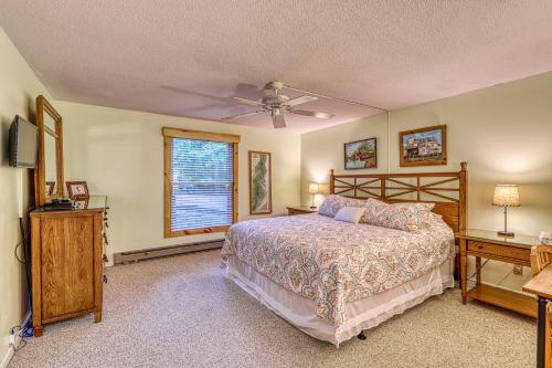 a bedroom with a bed and a ceiling fan at Bee Branch 24 in Sugar Mountain