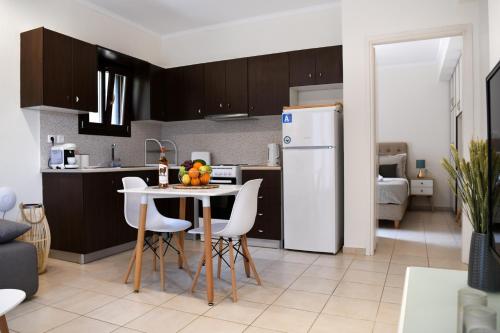 Virtuvė arba virtuvėlė apgyvendinimo įstaigoje Anemi Deluxe Apartment