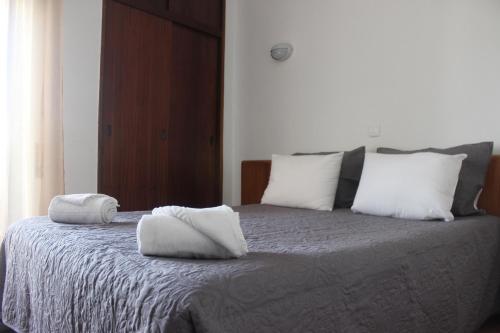 Кровать или кровати в номере Eurosun Hotels Loulé