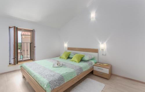 Postel nebo postele na pokoji v ubytování Apartment Rosetta