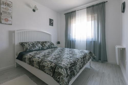 Postel nebo postele na pokoji v ubytování Hedon-Stone