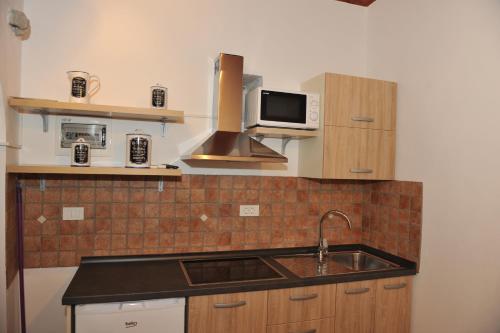 Una cocina o zona de cocina en Apartmaji Kumar