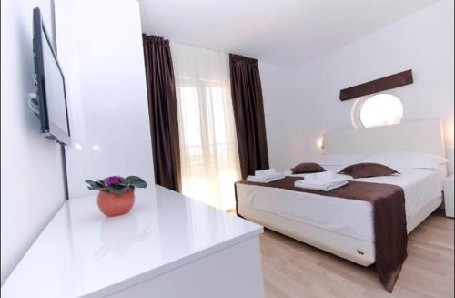 Ένα ή περισσότερα κρεβάτια σε δωμάτιο στο Villa Jasna