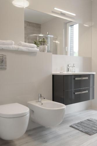 Koupelna v ubytování Gerves Apartamentai