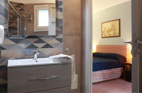 Et badeværelse på Dimora Villa Serena Porto Selvaggio