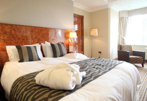 Postel nebo postele na pokoji v ubytování Pier Hotel