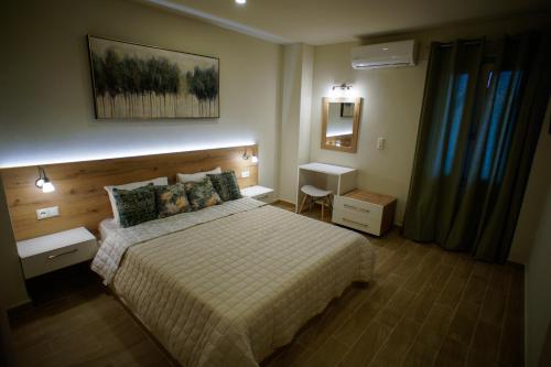 Ένα ή περισσότερα κρεβάτια σε δωμάτιο στο Sandika apartments