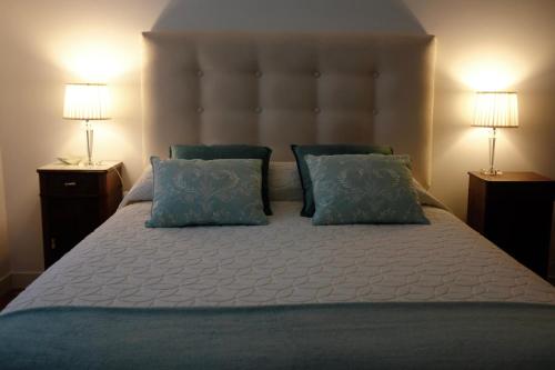 Łóżko lub łóżka w pokoju w obiekcie Maison Marais