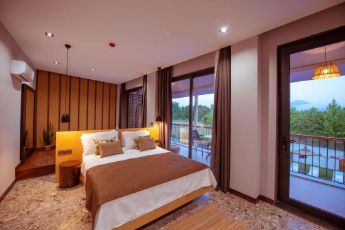 Ένα ή περισσότερα κρεβάτια σε δωμάτιο στο Arwen Hotel
