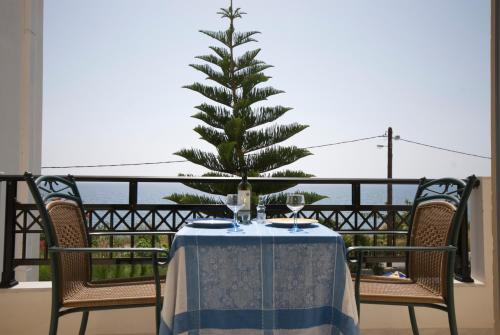 a christmas tree sitting on top of a table at Sarikampos Beach in Myrtos