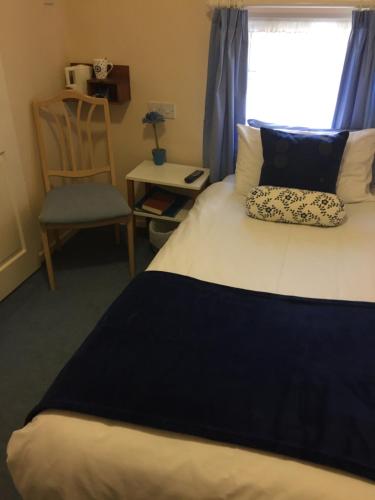 Кровать или кровати в номере Marlow Lodge