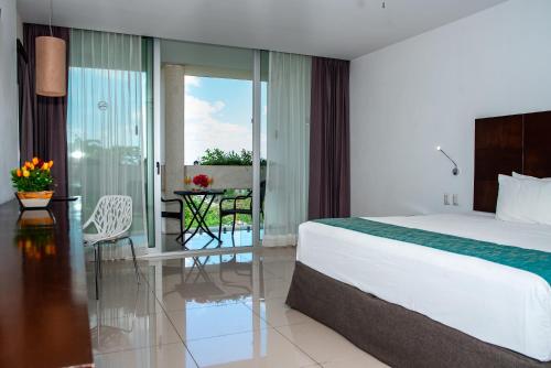 Postel nebo postele na pokoji v ubytování Mesón de la Luna Hotel & Spa