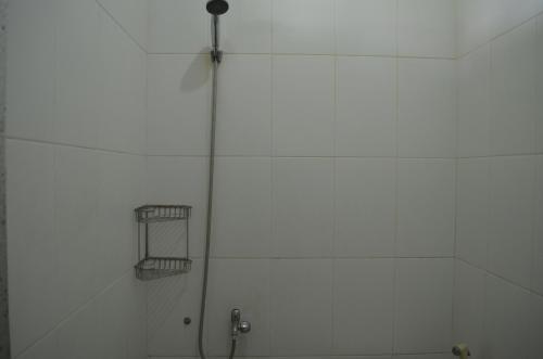 Kylpyhuone majoituspaikassa Sartika Hotel Prawirotaman