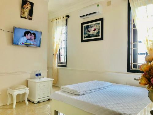 Katil atau katil-katil dalam bilik di Timothy Homestay Hue