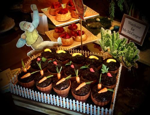 a display of cupcakes with carrots on top of them at The Inn on Knowles Hill Bed & Breakfast Hotel in Sonora